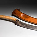 Bush Knife, 2020. 24 inches long (14 blade, 10 handle, inches). Salvaged cultivator shank, maple wood, leather. Photo Credit: Trent Watts